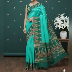 Elegant Teal and Gold Saree
